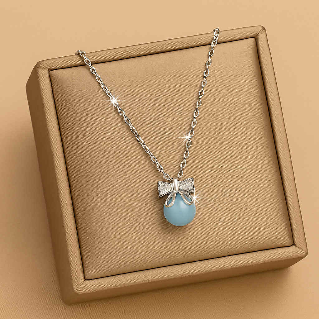 Blue Bow Pendant Necklace -Silver and sky Blue Bead